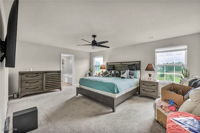 1633 Duncan Way, Streetsboro, OH 44241 - bedroom with carpet floors, a ceiling fan, and ensuite bathroom