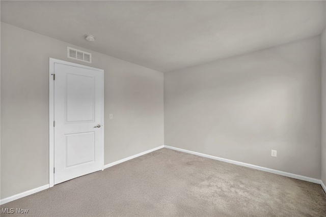 1633 Duncan Way, Streetsboro, OH 44241 - spare room featuring carpet floors and a smoke detector