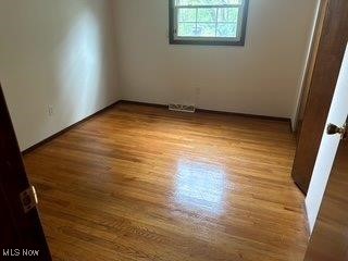 1531 E 290th St, Wickliffe, OH 44092 - unfurnished room featuring wood finished floors