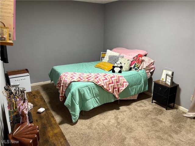 732 E High St, Alliance, OH 44601 - carpeted bedroom with baseboards