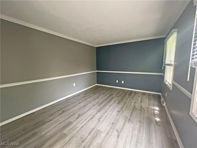 3061 Greenwich Ln, Brunswick, OH 44212 - empty room with wood finished floors and ornamental molding