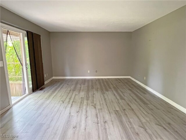 3061 Greenwich Ln, Brunswick, OH 44212 - spare room featuring baseboards and wood finished floors