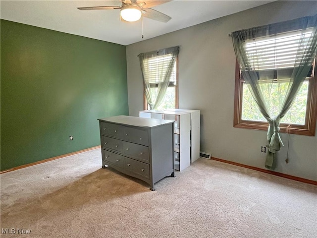 3061 Greenwich Ln, Brunswick, OH 44212 - unfurnished bedroom featuring light carpet and a ceiling fan