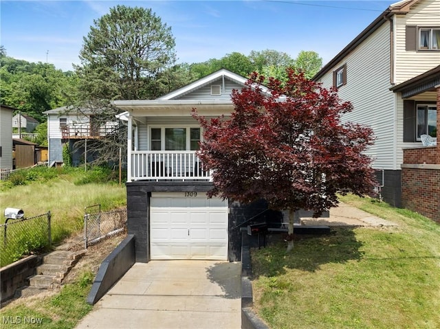 1309 7th St N, Martins Ferry, OH 43935 - view of front of property featuring concrete driveway and a garage