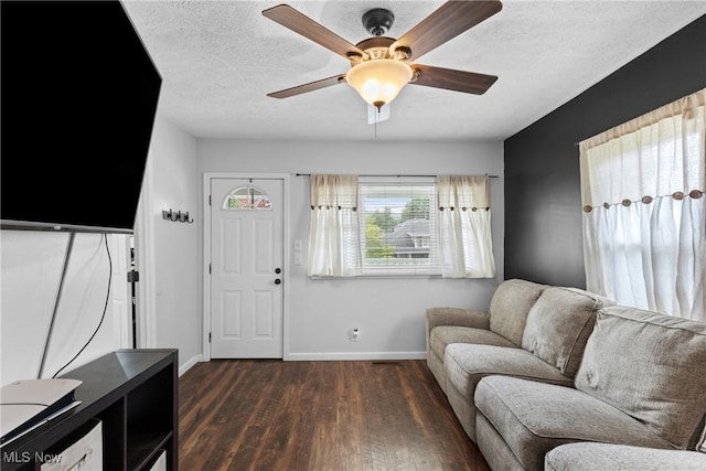 1309 7th St N, Martins Ferry, OH 43935 - living room featuring wood finished floors, a ceiling fan, and a textured ceiling