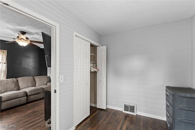 1309 7th St N, Martins Ferry, OH 43935 - living room featuring a ceiling fan and dark wood finished floors