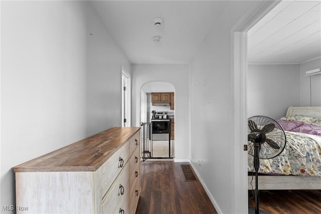 1309 7th St N, Martins Ferry, OH 43935 - hallway featuring dark wood finished floors and arched walkways