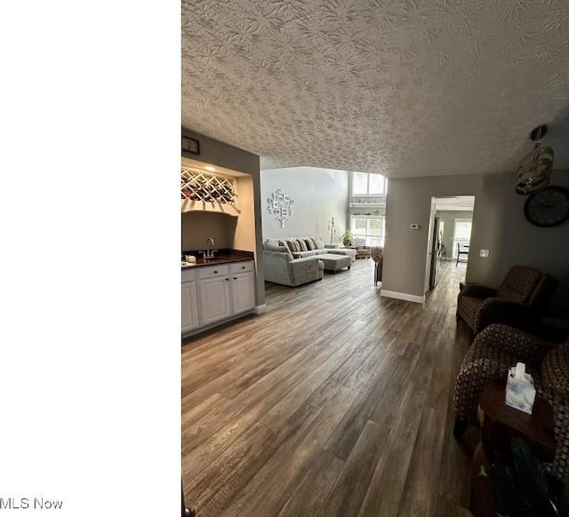 324 Buttermere Ln, Amherst, OH 44001 - living room featuring wood finished floors and baseboards