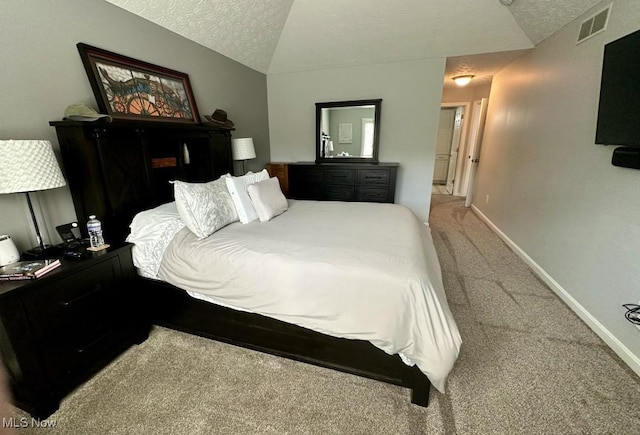 324 Buttermere Ln, Amherst, OH 44001 - bedroom featuring carpet flooring, a textured ceiling, and vaulted ceiling
