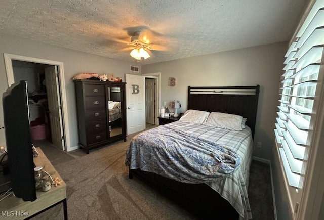 324 Buttermere Ln, Amherst, OH 44001 - bedroom featuring carpet, a textured ceiling, and ceiling fan