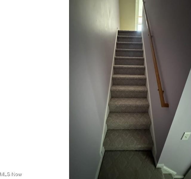 324 Buttermere Ln, Amherst, OH 44001 - stairs with baseboards and carpet flooring
