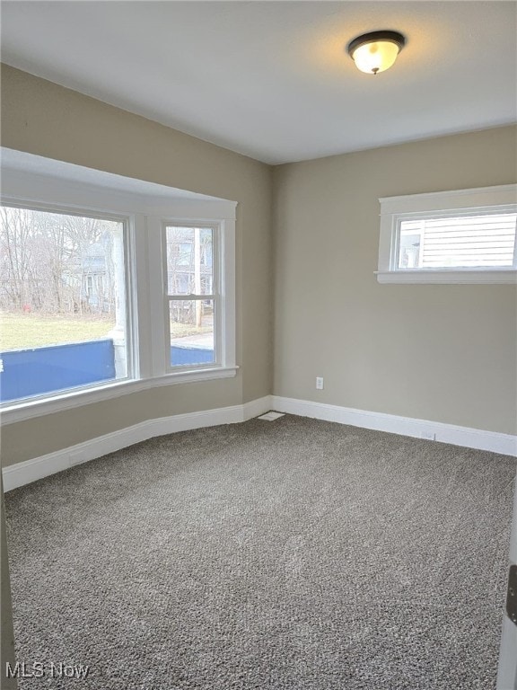 4175 E 95th St, Cleveland, OH 44105 - unfurnished room featuring carpet and baseboards