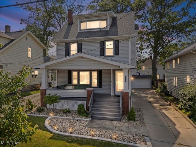 1646 Wyandotte Ave, Lakewood, OH 44107 - traditional style home featuring a porch, an outdoor structure, a detached garage, a shingled roof, and a chimney
