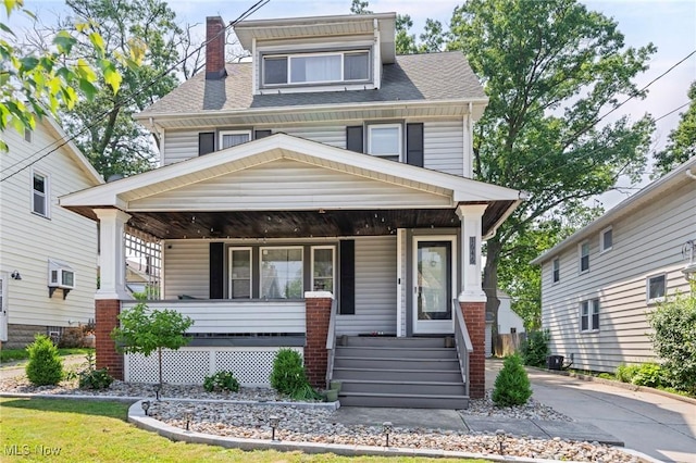 1646 Wyandotte Ave, Lakewood, OH 44107 - traditional style home featuring covered porch and a chimney