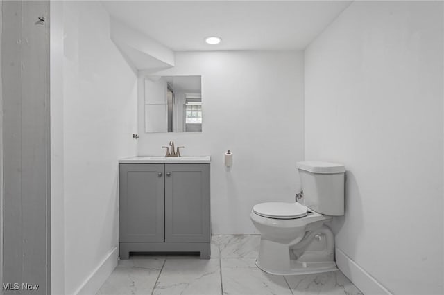 1646 Wyandotte Ave, Lakewood, OH 44107 - bathroom featuring vanity and marble look tile flooring