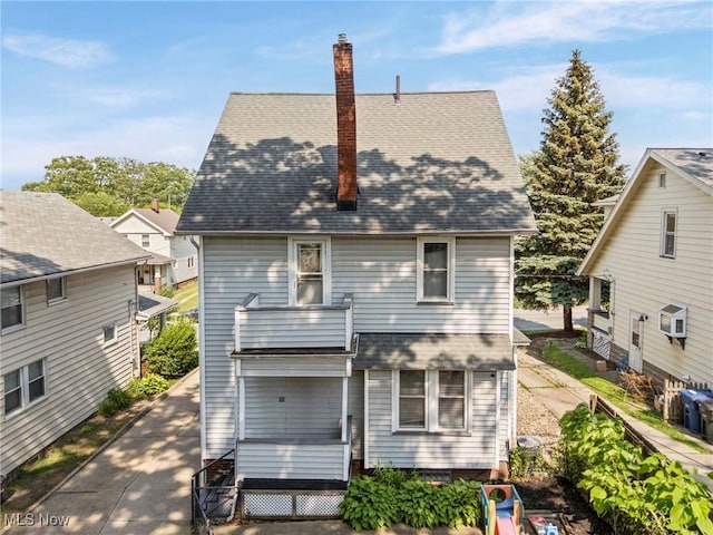 1646 Wyandotte Ave, Lakewood, OH 44107 - rear view of house with a chimney and a shingled roof