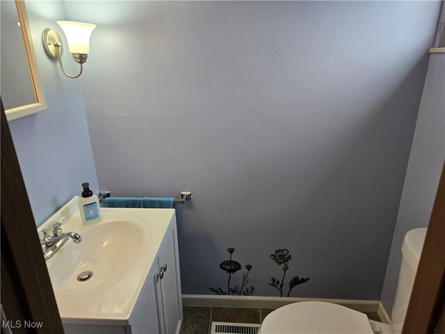 1038 Quincy St, Parkersburg, WV 26101 - bathroom with vanity and tile patterned flooring