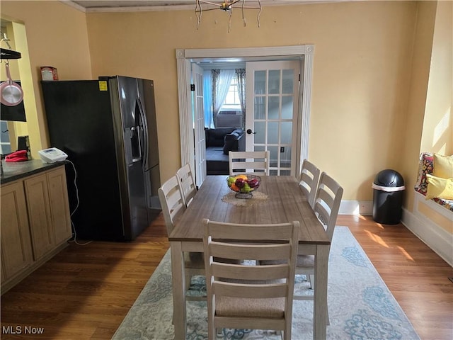 1038 Quincy St, Parkersburg, WV 26101 - dining area featuring french doors, wood finished floors, and ornamental molding