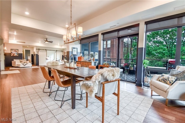 2044 Random Rd Unit 303, Cleveland, OH 44106 - dining room with wood finished floors and ceiling fan