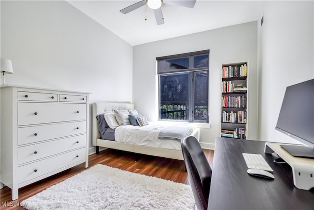 2044 Random Rd Unit 303, Cleveland, OH 44106 - bedroom with dark wood-style flooring, a desk, and a ceiling fan