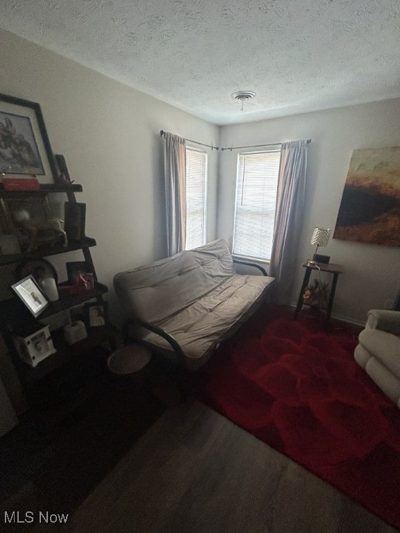 8050 Harbor Creek Dr Unit 1903, Mentor-On-The-Lake, OH 44060 - bedroom featuring a textured ceiling and carpet flooring