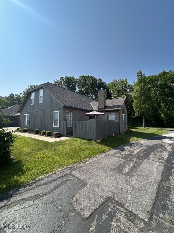 8050 Harbor Creek Dr Unit 1903, Mentor-On-The-Lake, OH 44060 - view of side of home with a chimney