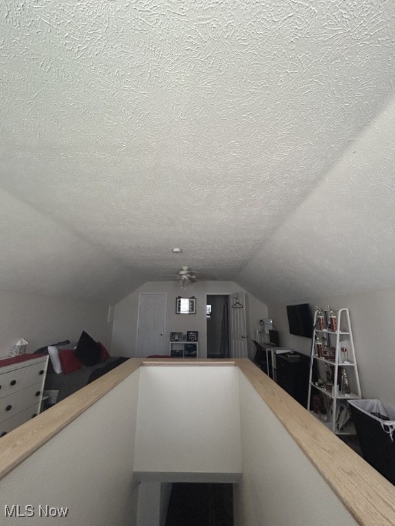 8050 Harbor Creek Dr Unit 1903, Mentor-On-The-Lake, OH 44060 - additional living space with a textured ceiling and vaulted ceiling