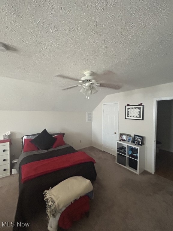 8050 Harbor Creek Dr Unit 1903, Mentor-On-The-Lake, OH 44060 - carpeted bedroom featuring a textured ceiling, lofted ceiling, and a ceiling fan