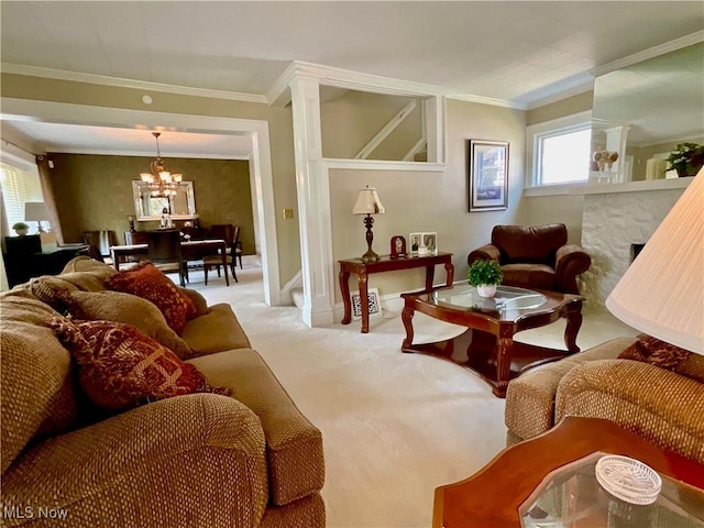 904 Chalker St, Akron, OH 44310 - living room featuring a chandelier, carpet flooring, ornamental molding, and a fireplace