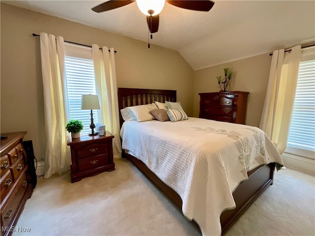 904 Chalker St, Akron, OH 44310 - bedroom with light colored carpet, vaulted ceiling, and a ceiling fan