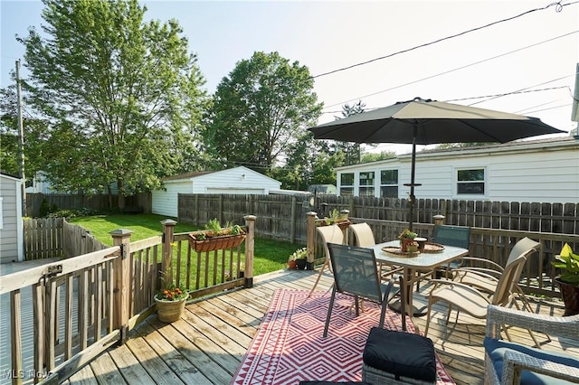 236 Johnson Ave, Cuyahoga Falls, OH 44221 - deck with outdoor dining area and a fenced backyard