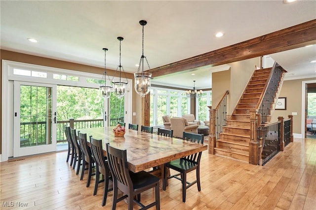 3116 Aviemore Way, Richfield, OH 44286 - dining room with a chandelier, light wood finished floors, recessed lighting, stairs, and ornamental molding