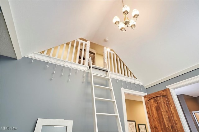 3116 Aviemore Way, Richfield, OH 44286 - staircase featuring vaulted ceiling and a chandelier