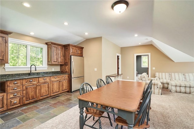 3116 Aviemore Way, Richfield, OH 44286 - dining room with recessed lighting, lofted ceiling, and dark stone finish flooring