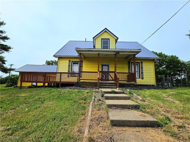 10 Browns Ridge Rd, Rockport, WV 26169 - view of front of property with a metal roof, a front lawn, and a porch