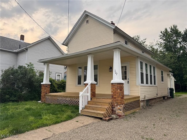 307 Lucas St, Barberton, OH 44203 - view of front of home with a porch