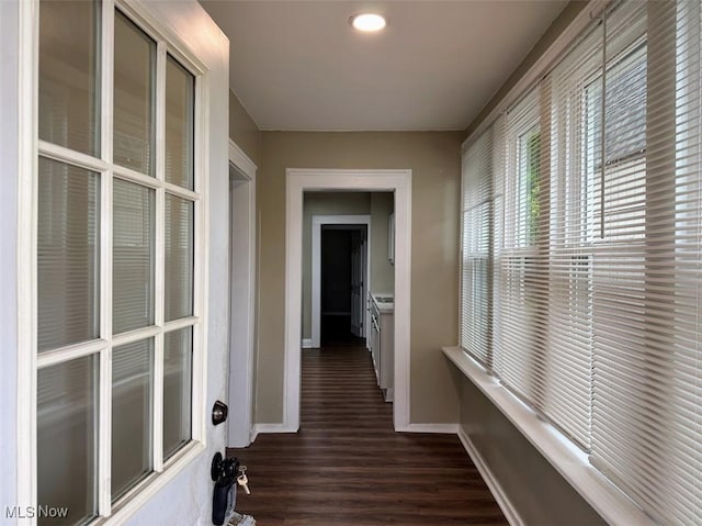 307 Lucas St, Barberton, OH 44203 - hallway with baseboards and dark wood-style floors
