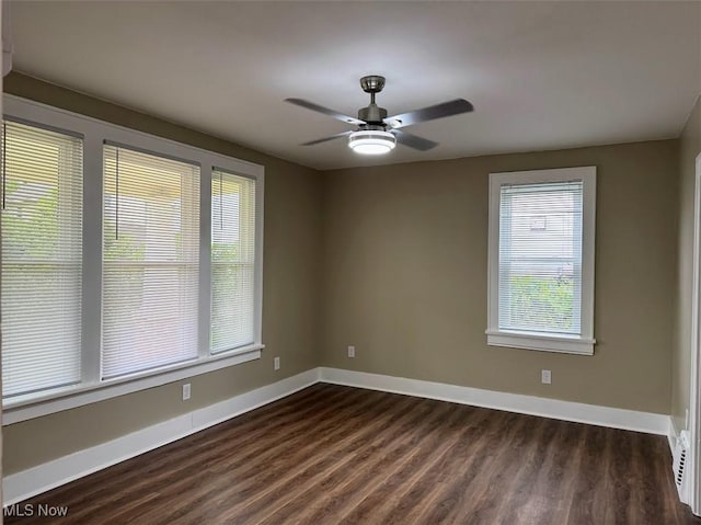 307 Lucas St, Barberton, OH 44203 - unfurnished room featuring dark wood finished floors and a ceiling fan