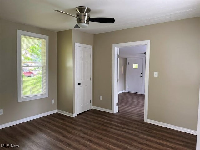 307 Lucas St, Barberton, OH 44203 - unfurnished room with dark wood-type flooring and a ceiling fan