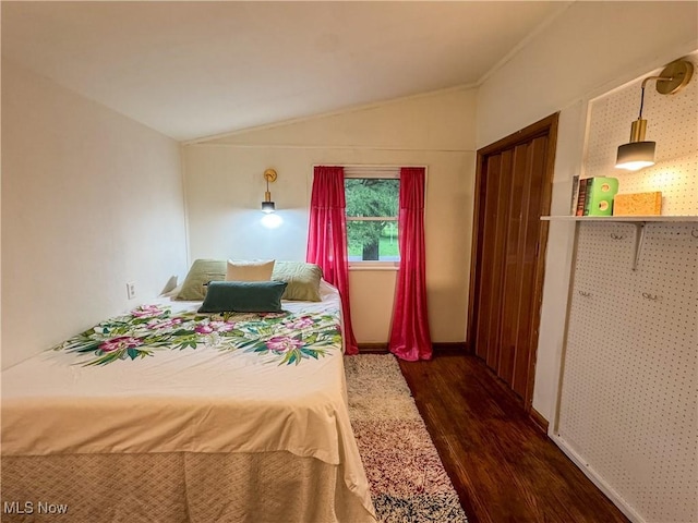 1121 Old Rosemar Rd, Parkersburg, WV 26104 - bedroom with lofted ceiling and dark wood finished floors