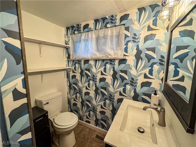 1121 Old Rosemar Rd, Parkersburg, WV 26104 - bathroom with vanity, wallpapered walls, tile patterned floors, and a textured ceiling