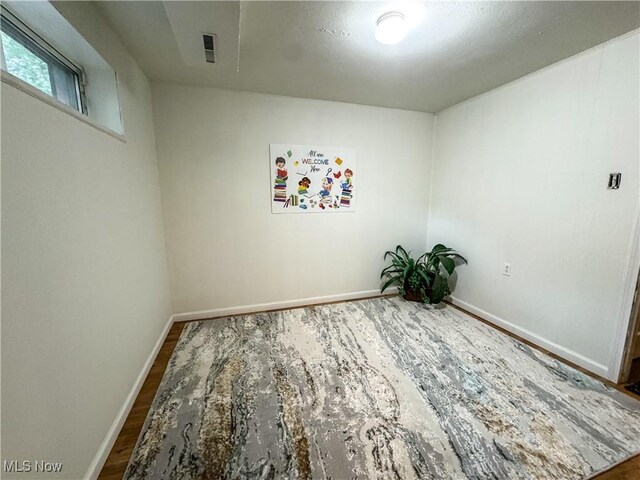 1121 Old Rosemar Rd, Parkersburg, WV 26104 - spare room featuring wood finished floors