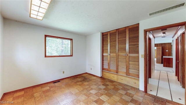 7780 Clarion Dr, Chagrin Falls, OH 44022 - unfurnished bedroom featuring baseboards