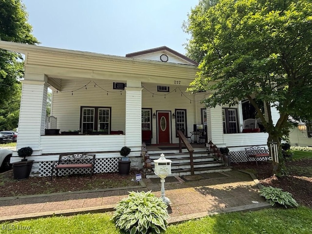 217 Meadowbrook Ave, Boardman, OH 44512 - view of front of home featuring a porch