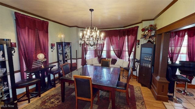 217 Meadowbrook Ave, Boardman, OH 44512 - dining area with ornamental molding and a chandelier