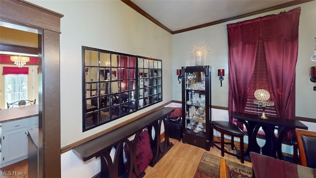 217 Meadowbrook Ave, Boardman, OH 44512 - dining space with ornamental molding, wood finished floors, and a chandelier
