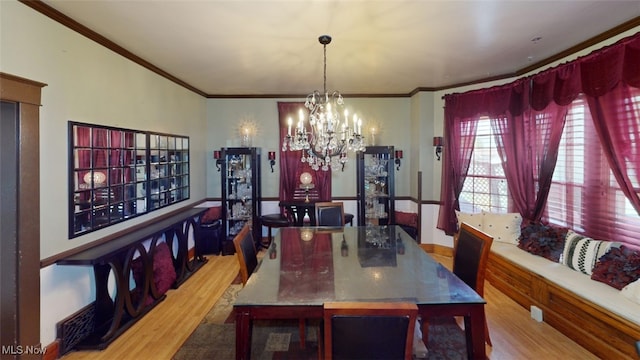 217 Meadowbrook Ave, Boardman, OH 44512 - dining room with wood finished floors, a chandelier, and ornamental molding