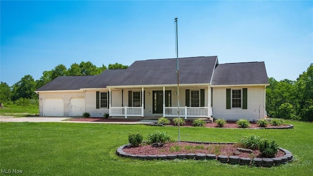 9910 Matchett Rd, Norwich, OH 43767 - view of front of home featuring a porch, a garage, a front yard, and concrete driveway