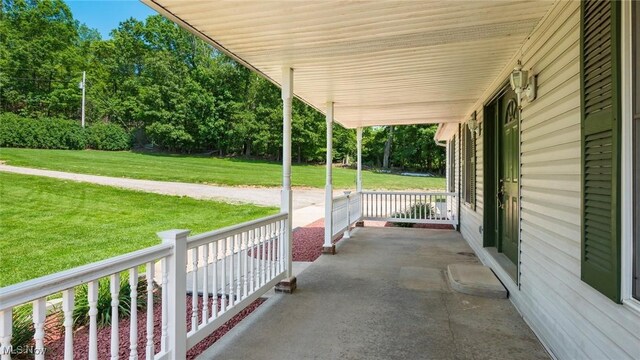 9910 Matchett Rd, Norwich, OH 43767 - covered porch with a lawn