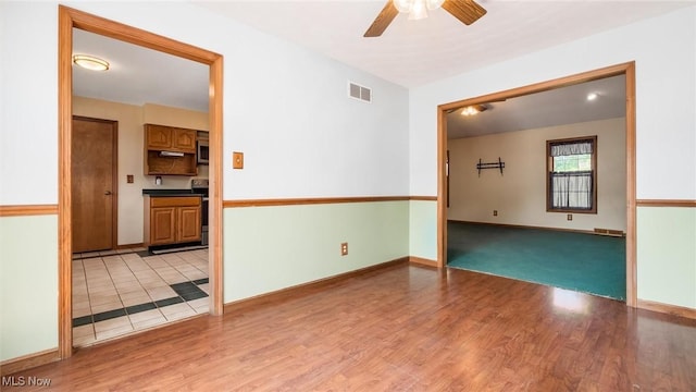 9910 Matchett Rd, Norwich, OH 43767 - unfurnished room featuring ceiling fan and light wood finished floors